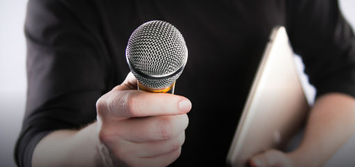 microphone pointed toward viewer
