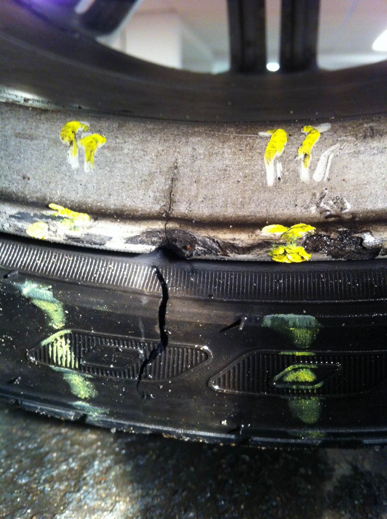 Pothole damage to car tyre and rim