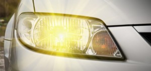 Front headlight illuminated on car