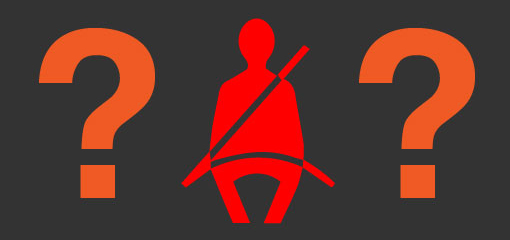 dashboard seatbelt warning light with an orange question mark on each side of it