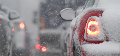 rear of a Mini in heavy snow