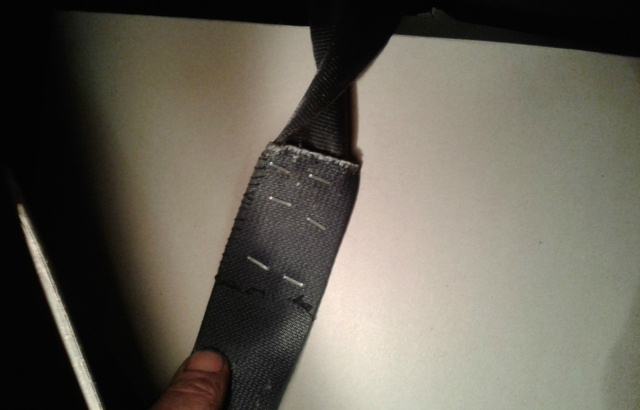 seatbelt repaired with staples