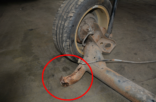 How safe/dangerous is this? Part that holds rear left suspension to frame  seems to have broken loose : r/MechanicAdvice