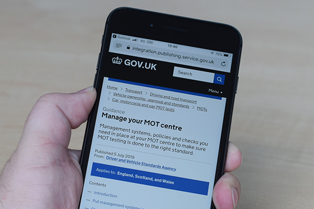 the 'Manage your MOT centre' guide displayed on a mobile phone