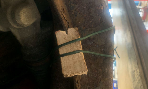 Wooden stake and cable repair to wheelarch