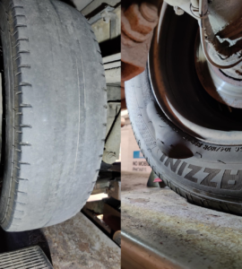 Two severely worn tyres, one which is completely bald, and the other one with a large bulge in the side wall. 